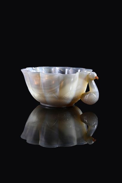 null Elegant small agate bowl with a chubby body on a heel, finely engraved below...