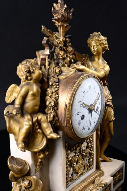 null Important gilt bronze and white marble clock, the white enamel dial flanked...