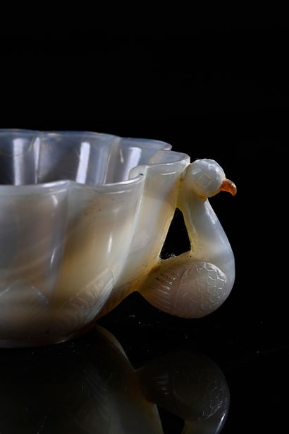 null Elegant small agate bowl with a chubby body on a heel, finely engraved below...