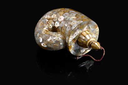 null Powder flask in the shape of a marine conch decorated with mother-of-pearl plates...