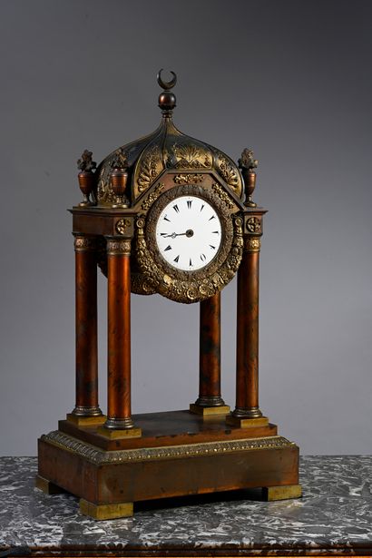 null Rare portico clock in the Turkish style with double face in chased gilt bronze...