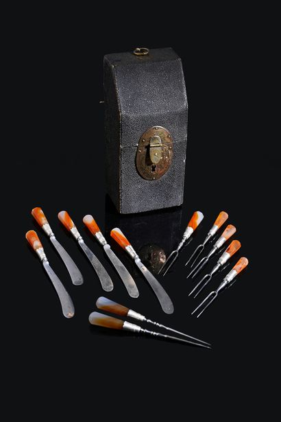 null Travel kit including twelve pieces of faceted agate, five knives, five forks...