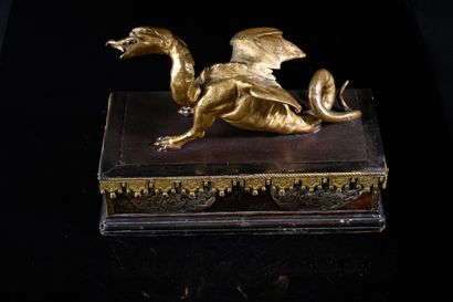null Cocatrix in gilt bronze. Fantastic animal with the head of a rooster, the wings...