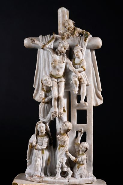 null Descent from the cross in alabaster carved with gold highlights; on a scroll...
