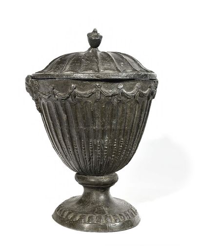 null Large covered lead pot, the lid with scalloped decoration, the shoulder lined...