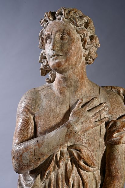 null Cariatide en applique en chêne sculpté, dos creusé, représentant un homme engainé,...