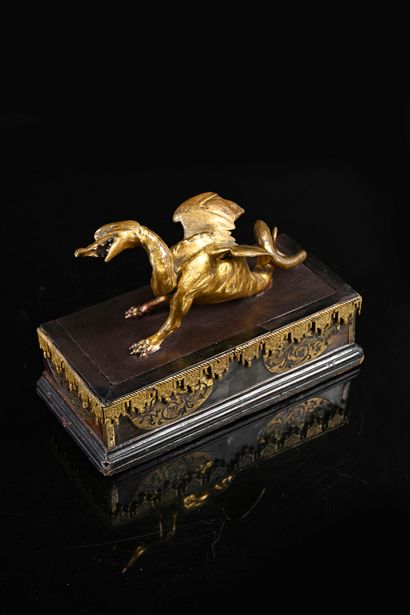 null Cocatrix in gilt bronze. Fantastic animal with the head of a rooster, the wings...