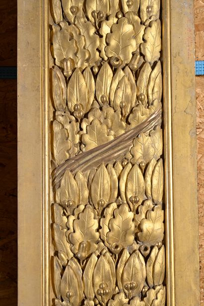 null Suite of four gilded and silvered oak woodwork uprights, decorated with laurel...