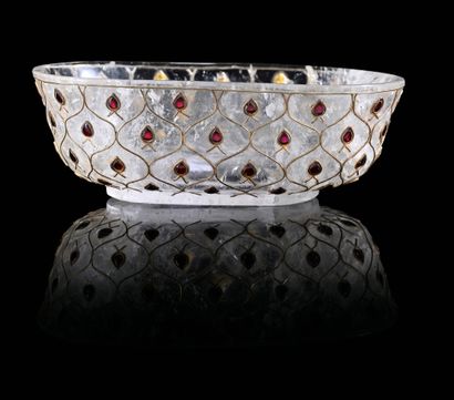 null Rock crystal cup, resting on a small heel decorated with buds inlaid with small...