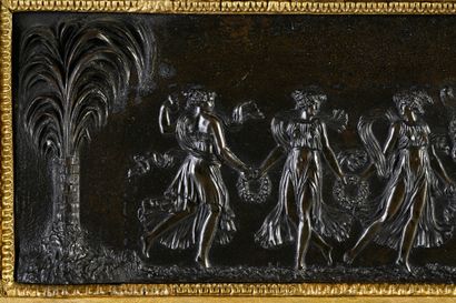 null Bronze plate decorated in low relief with a frieze of vestals between two palm...