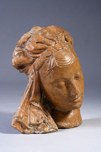 null Head of Virgin in terracotta.
In the style of the workshop of della Robia of...