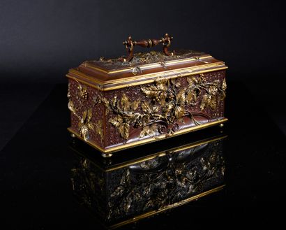 Important ormolu jewelry box with a red patina...