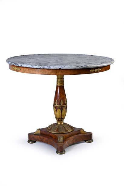 null Mahogany and mahogany veneer pedestal table, the circular top in Bardiglio Forito...