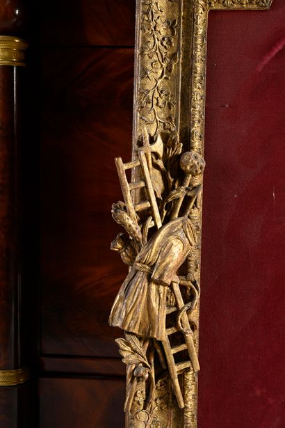 null Important and rare wooden frame richly carved and gilded with a curved form...