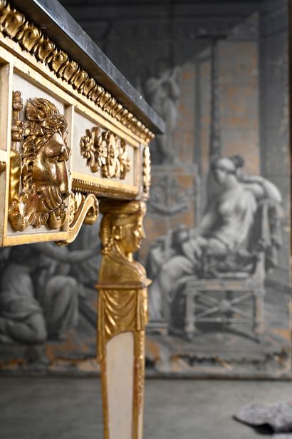 null Important pair of gilded and relacquered carved wood consoles, with a mirror...