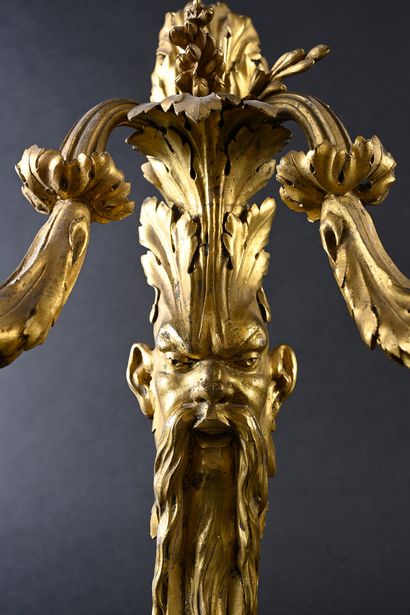 null Pair of sconces in finely chased and gilded bronze, the shaft in console with...