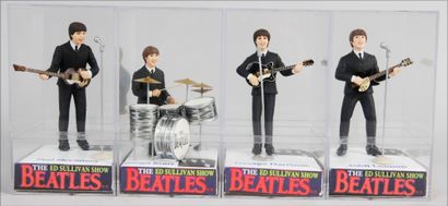 THE BEATLES : Un ensemble de 4 figurines...