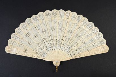 null 59 bis
Cartouches, circa 1860 
Bone fan of broken type pierced with a repeated...