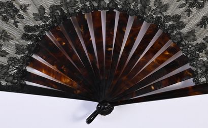 null Scrolls and bouquets, Europe, circa 1890 
Large folded fan, the leaf in black...