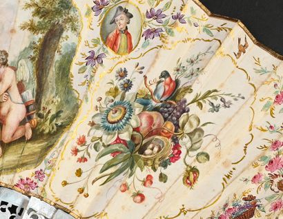 null Lovers in the four seasons, circa 1750 
Folded fan, the leaf in skin, mounted...