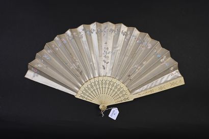 null Three fans, Europe, circa 1880
The cream satin leaves painted with flowers or...