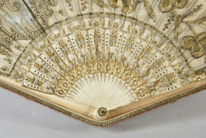 null Clovers, Europe, circa 1900 
Folded fan, the tulle leaf decorated with embroidered...