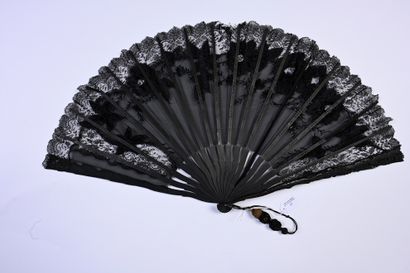 null Embroidered flowers, Europe, circa 1890
Folded fan, the leaf in black gauze...