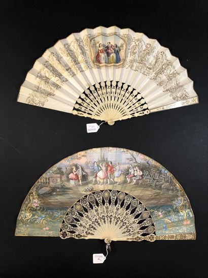 null Two fans, Europe, circa 1850
The leaves are made of lithographed paper; one...
