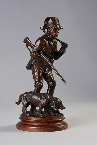 Alfred DUBUCAND (1828 - 1894) Chasseur au renard et son chien.
Bronze à patine brune,...