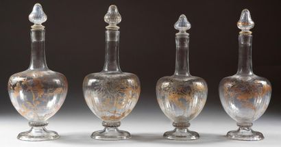 Emile GALLE (1846-1904) Suite de 4 carafes en cristal sur piédouche finement côtelé...