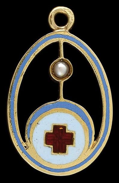null Insigne pendentif miniature de la Croix-Rouge, offert lors des Fêtes de Pâques...