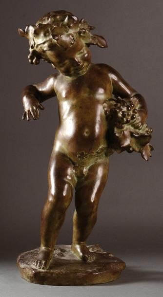 Charles-Louis MALRIC (1872-1942) Bacchus enfant. Sculpture en bronze à patine verte....