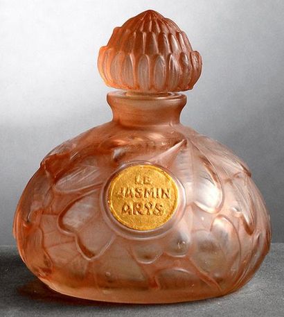Arys «Le Jasmin» - (années 1920) Flacon en verre incolore pressé moulé de section...