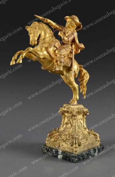 null LOUIS XIII, roi de France (1553-1610). Statue équestre en bronze doré le représentant...