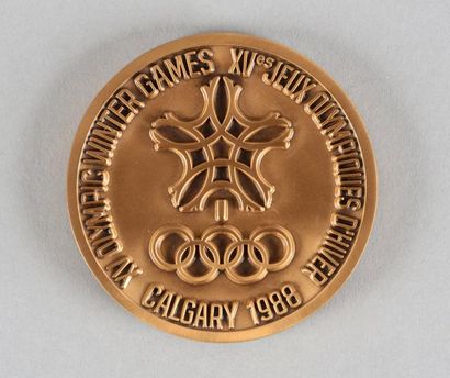 1988. Calgary. Médaille officielle de participant....