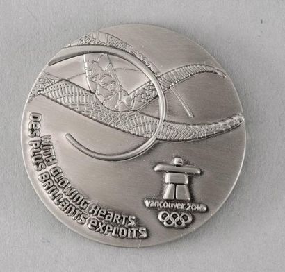 null 2010. Vancouver. Médaille officielle de participant aux XXIème Jeux d'hiver....