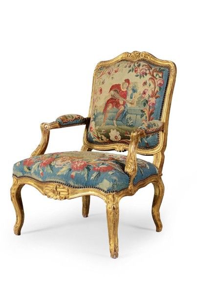 null Suite de quatre fauteuils «à la reine» en bois sculpté et doré, à dossier plats...