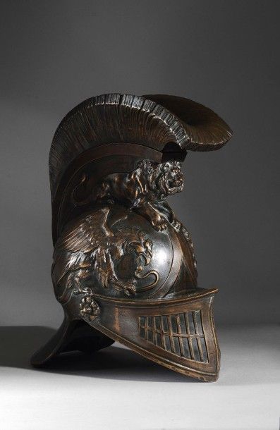 null Casque à la romaine en bronze à double patine, le corps du casque à décor de...