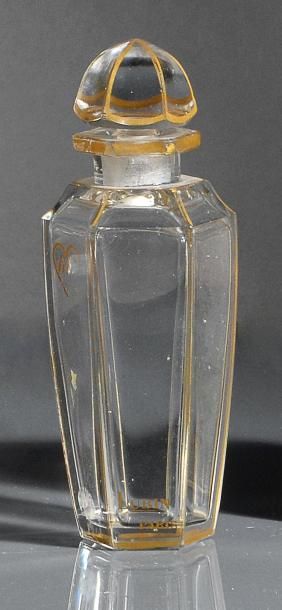 Lubin «Tibi» - (années 1920) Flacon en verre incolore pressé moulé de section cylindrique...