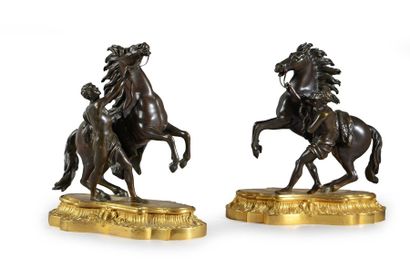 Nicolas COUSTOU (1658-1733) d'après 
Les chevaux de Marly.
Paire de bronze à patine...