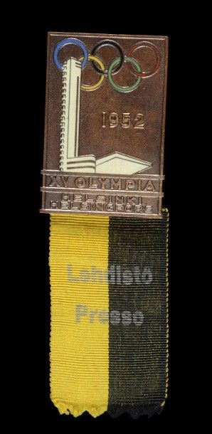 null 1952. Helsinki. Badge de presse des XVe Jeux Olympiques. Avec ruban. En bronze....