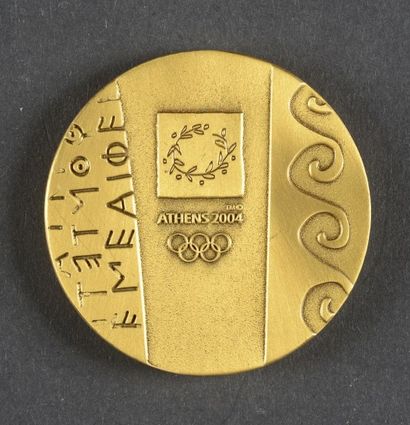 null 2004. Athénes. Médaille de participant. En bronze. Diamètre 50 mm. Participation...