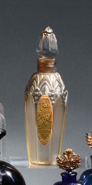 J.Lamotte «Ton Parfum» - (années 1920).
Flacon en verre incolore pressé moulé de...