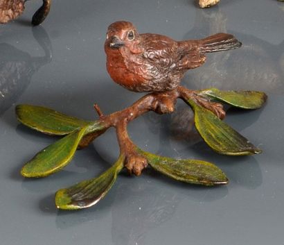 null Oiseau sur une branche.
Bronze peint au naturel
L.: 8,2 cm