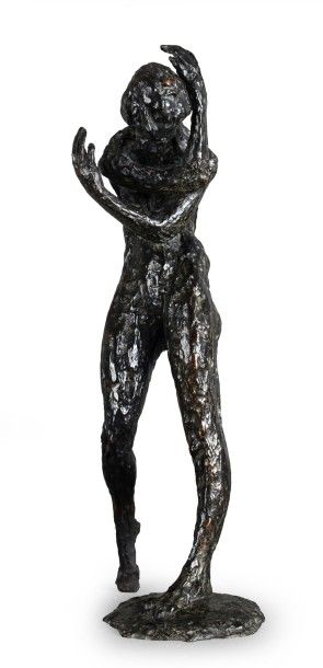 André HOGOMMAT (1925-) Femme debout.
Bronze à patine brun.
Exemplaire 1/8. Fonderie...
