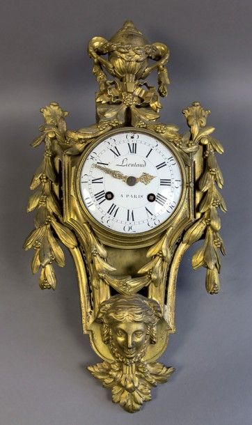 null Cartel d'applique Louis XVI en bronze doré, à cadran émaillé marqué de l'horloger...