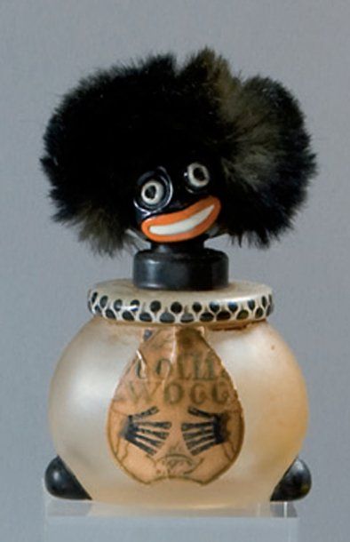 VIGNY - «Le GolliWogg» - (1918) Flacon africaniste en verre incolore pressé moulé...
