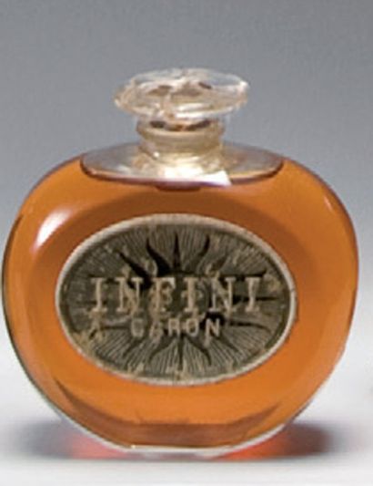 CARON - «Infi ni» - (années 1930) Flacon en cristal incolore de Baccarat de section...