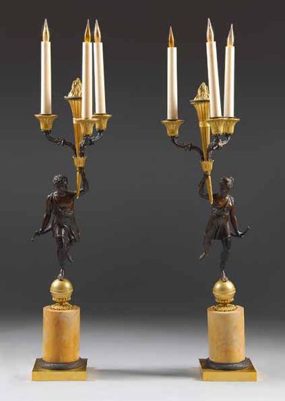 null Paire de candélabres à quatre lumières en bronze patiné et doré figurant diane...