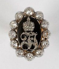 null Bague en or et diamants à décor du monogramme de François-Joseph Ier empereur...